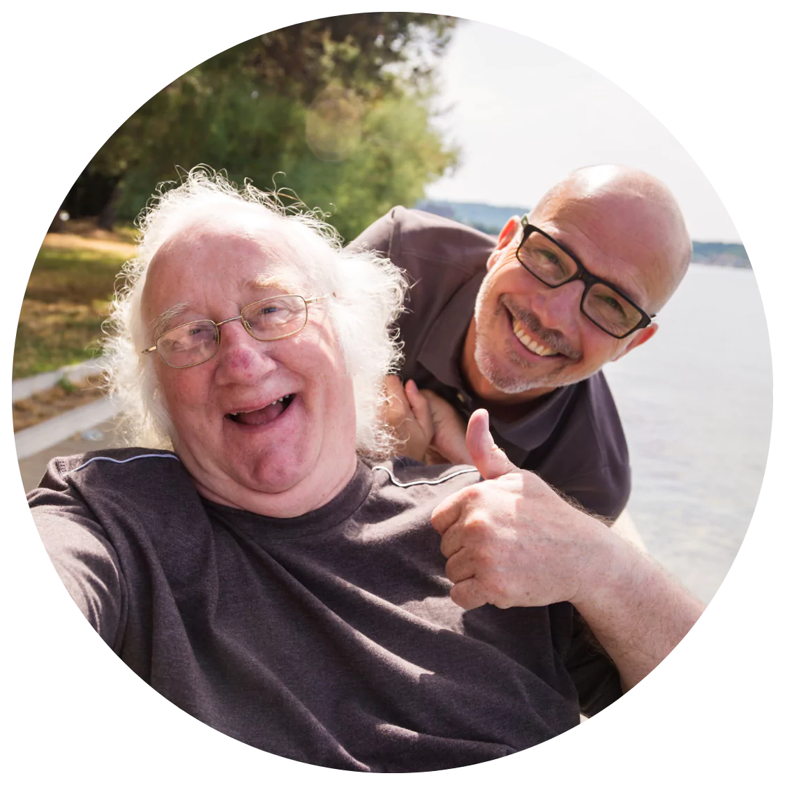 Two friends are laughing and enjoying the outdoors together